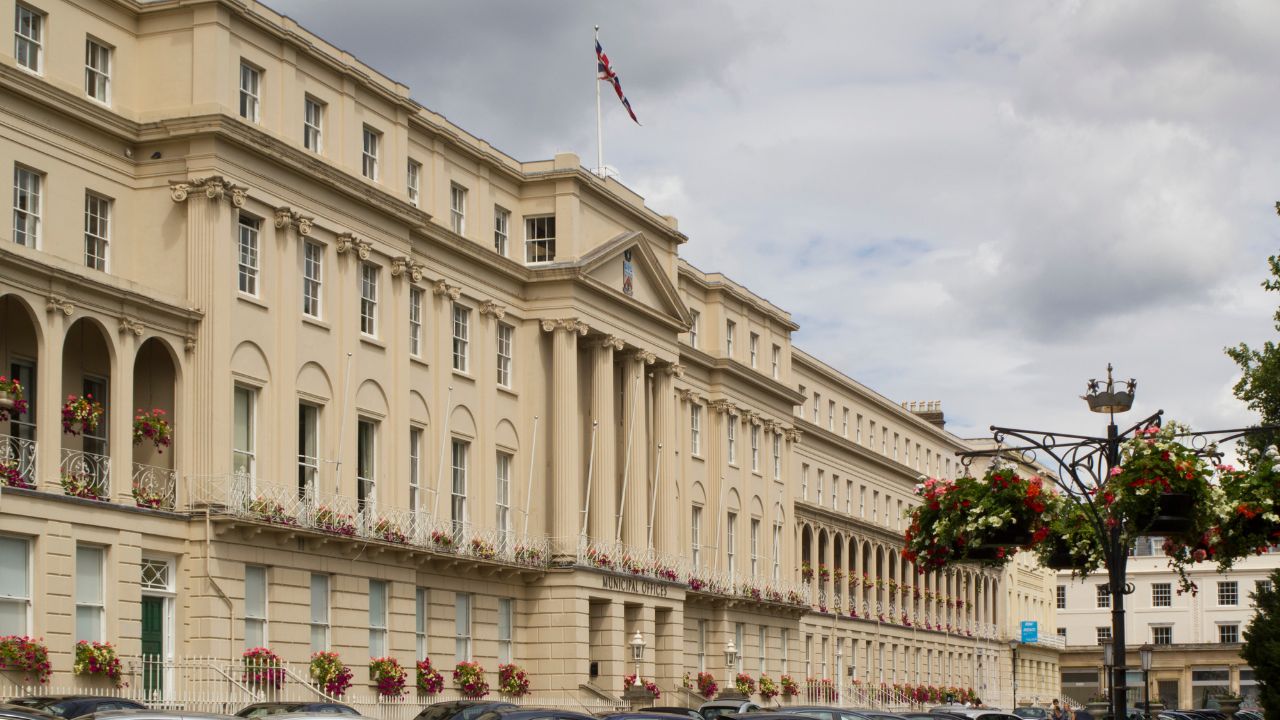 A chef frying food in a wok