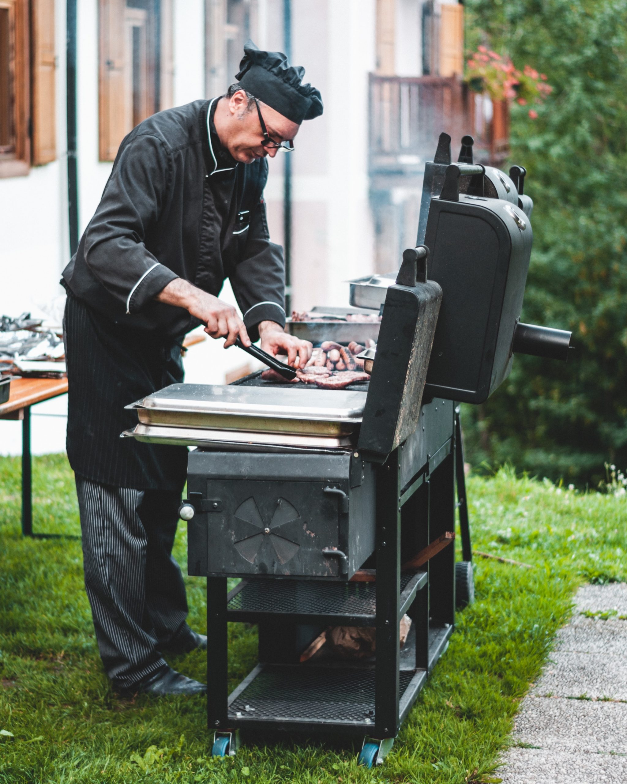 A chef frying food in a wok